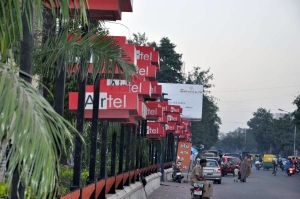 Roadside Advertisements at busy road near Shahibaug